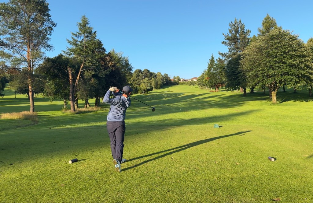 Man tees off the 17th hole at Dalmuir Golf Course