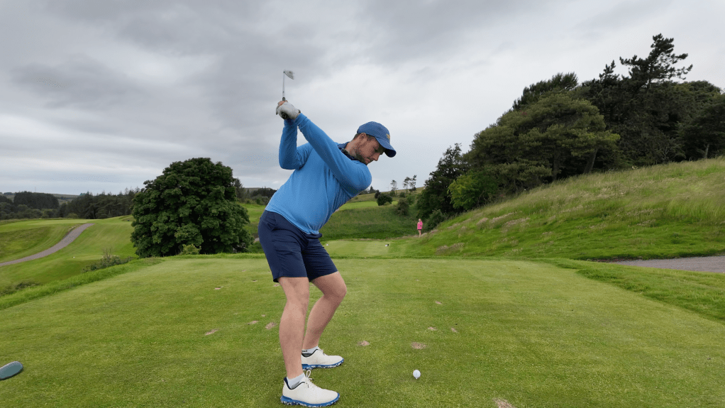 Cam at the top of his golf back swing on the new 10th hole at Eastwood Twelve.
