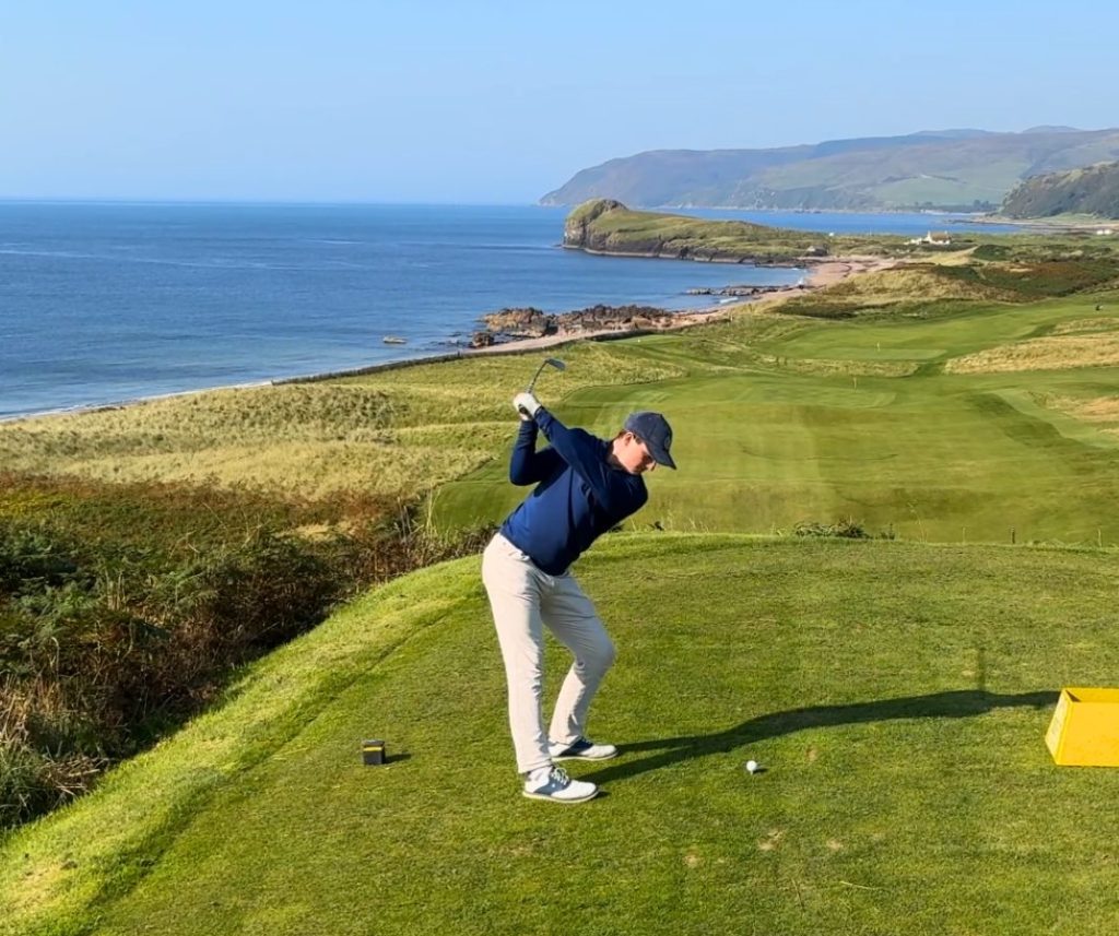 Cam stands to hit his tee shot on the 11th tee box at Dunaverty Golf Club